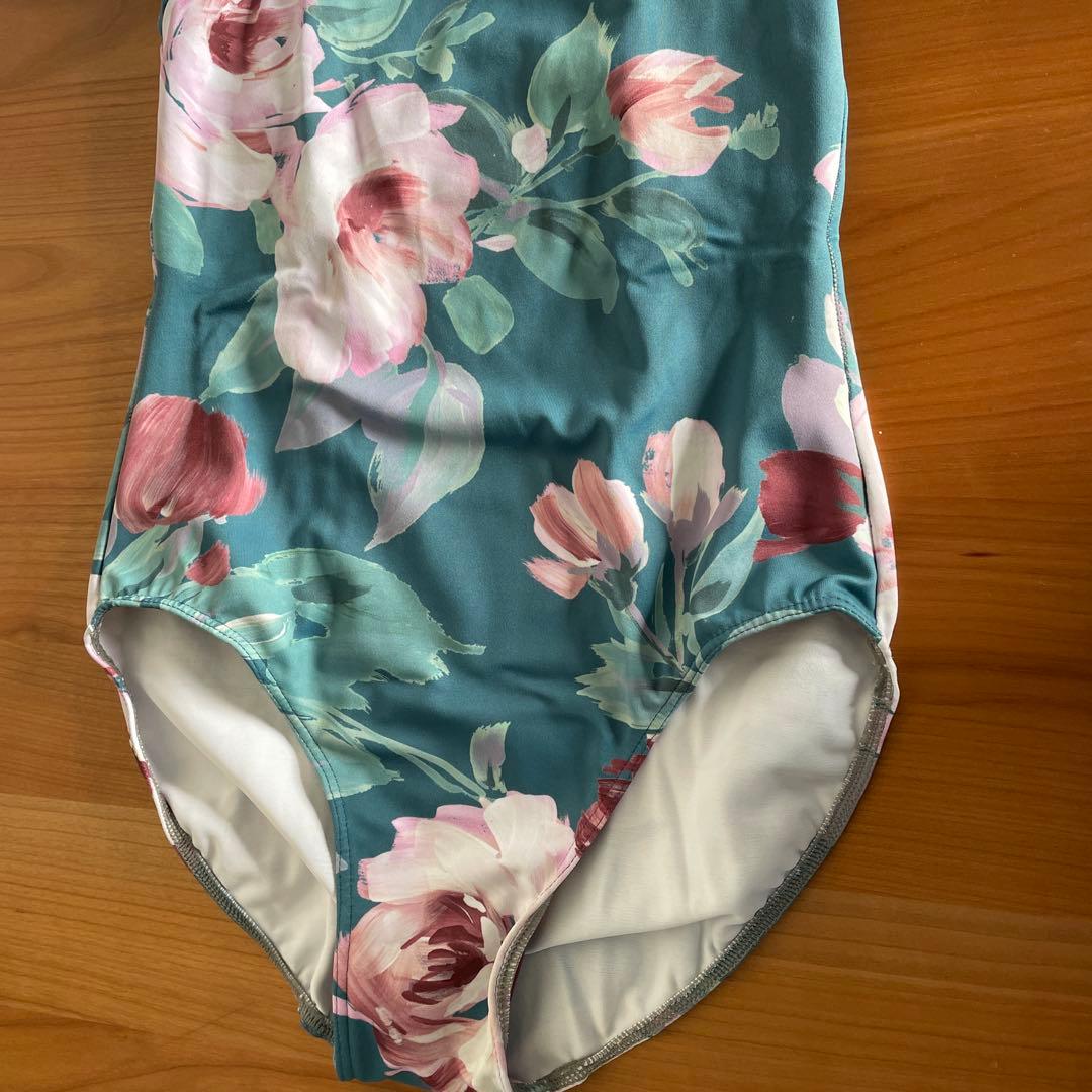 stina スティナ グリーン花柄ハイネックレオタード - メルカリ